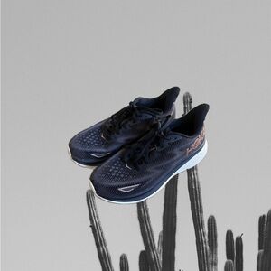Hoka black and rose gold Clifton 9